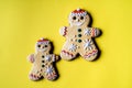 Christmas gingerbread in the shape of angel on yellow background Royalty Free Stock Photo