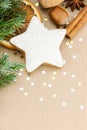 christmas gingerbread, spices and nuts on wrapping paper background Royalty Free Stock Photo