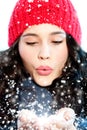 Christmas girl blowing snow in hands Royalty Free Stock Photo