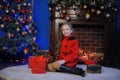 Christmas girl in a red coat Royalty Free Stock Photo