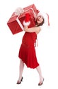Christmas girl in santa hat with big gift box. Royalty Free Stock Photo