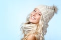 Christmas girl, young beautiful smiling and give a wink over blu Royalty Free Stock Photo