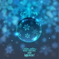 Christmas glass ball on blurred background with snowflakes, Royalty Free Stock Photo