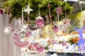 Christmas glass bowl with small pink balls at Royalty Free Stock Photo