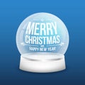 Christmas glass snow ball on blue background. Realistic crystal snow ball with light reflection