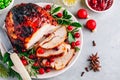 Christmas Glazed Ham with cranberry sauce. Roasted Holiday Pork Meat