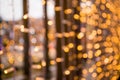 Christmas glowing Golden lights Background. Gold Holiday New year Abstract Glitter Defocused Background Royalty Free Stock Photo