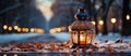 Christmas glowing lantern stands on snowy ground against bokeh of holiday lights, view from ground plane, copy space. AI-Generated Royalty Free Stock Photo