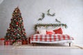 Well-Decorated Christmas Room with Bauble-Adorned Xmas Tree and Wrapped Gift Boxes Royalty Free Stock Photo