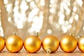 Christmas gold balls in winter setting,Winter holidays concept.