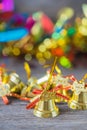 Christmas gold bells with bokeh decorations background. Royalty Free Stock Photo