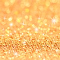 Christmas gold blinking background. Bokeh and Stars Royalty Free Stock Photo