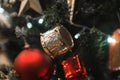 Christmas gold Drum hanging on a beautiful Christmas tree close view and macro Royalty Free Stock Photo