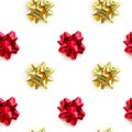 Christmas gold and red ribbon bow pattern on white background. Design composition Royalty Free Stock Photo