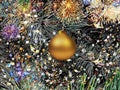 Christmas gold and silver  ball on green tree and confetti illumination blurred light holiday background greetings card Royalty Free Stock Photo