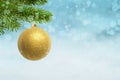 Christmas golden color ball hung on the Christmas tree