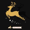 Christmas golden decoration. Gold reindeer silhouette in black background Royalty Free Stock Photo