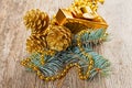 Christmas golden decorations on wooden background