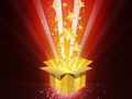 Christmas Golden Gift Box with Stars Royalty Free Stock Photo