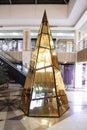 Christmas Golden installation in the form of a Christmas tree. Moscow. Shopping center