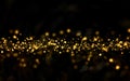 Christmas golden light shine particles bokeh on black club party holiday copy space Royalty Free Stock Photo