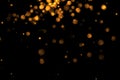 Christmas golden light shine particles bokeh loopable from top on black background, holiday congratulation greeting party happy ne Royalty Free Stock Photo