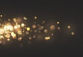 Christmas golden lights. Background of bright glow bokeh