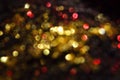 Christmas golden and red lights on black night  background,  bright glow bokeh Royalty Free Stock Photo