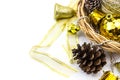 Christmas golden and silver decorations on white background. Basket weave on table top view