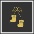 Christmas golden socks on a black background. elegant glitter de