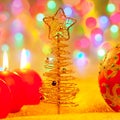 Christmas golden tree baubles and candles Royalty Free Stock Photo