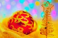 Christmas golden tree with baubles and lights Royalty Free Stock Photo