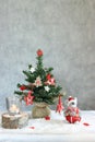 Christmas gray background with candles and tree