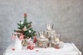 Christmas gray background with candles and tree