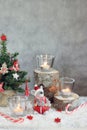 Christmas gray background with candles and tree