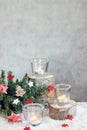 Christmas gray background with candles and tree