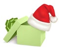 Christmas green box and santa hat. Royalty Free Stock Photo