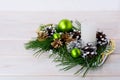 Christmas green ornaments, snowy and silver pinecones Royalty Free Stock Photo