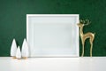 Christmas green theme product mockup with gold reindeer and white Xmas trees.