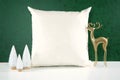 Christmas green theme product mockup with gold reindeer and white Xmas trees.