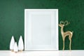 Christmas green theme product mockup with gold reindeer and white Xmas trees.