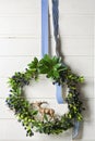 Christmas green wreath of evergreen and berries on white background