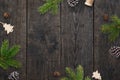 Christmas greeting card background with Christmas decorations on dark wooden table Royalty Free Stock Photo