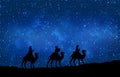 Blue Christmas greeting card banner background with Three Wise Men in the desert. Royalty Free Stock Photo