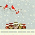 Christmas greeting card with family of owls on fence Royalty Free Stock Photo