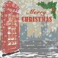 Christmas greeting card with famous red London telephone booth and holy branch. Royalty Free Stock Photo