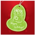 Christmas greeting card. Green tag with Santa Bag