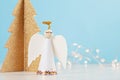 Christmas greeting card mock up with paper angel, christmas tree Royalty Free Stock Photo