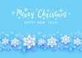 Christmas greeting card with paper snowflakes border on blue background for Your holiday design Royalty Free Stock Photo