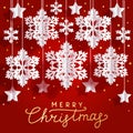 Christmas greeting card with paper snowflakes and stars on red background for Your holiday design Royalty Free Stock Photo